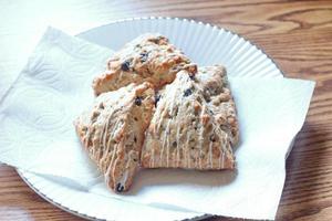 blue berry scones served in white plates photo