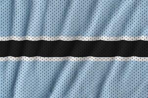 Bandera de Botswana impresa en una tela de malla de ropa deportiva de nailon y poliéster. foto