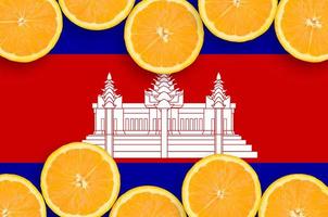 Cambodia flag  in citrus fruit slices horizontal frame photo