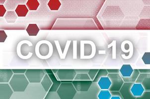 Ghana flag and futuristic digital abstract composition with Covid-19 inscription. Coronavirus outbreak concept photo