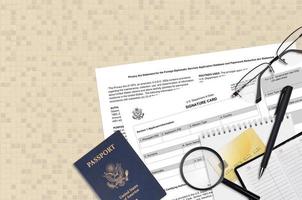 Department of State form DS4139 Signature card lies on table and ready to fill. Paperwork during operations with US Passport concept photo