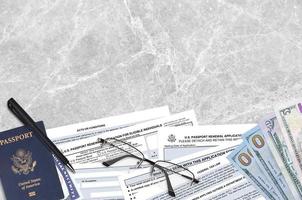 Department of State form DS82 U.S. Passport renewal application for eligible individuals lies on table and ready to fill. Paperwork during operations with US Passport concept photo
