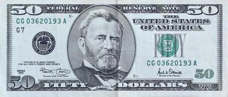 Portrait of US president Ulysses Simpson Grant on 50 dollars banknote closeup macro fragment. United states fifty dollars money bill photo