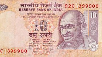 Mahatma Gandhi face on Indian bank note ten rupees. 10 Rupee National currency of India photo