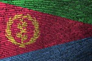Eritrea flag  is depicted on the screen with the program code. The concept of modern technology and site development photo