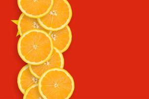 China flag and citrus fruit slices vertical row photo
