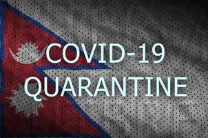 Nepal flag and Covid-19 quarantine inscription. Coronavirus or 2019-nCov virus photo