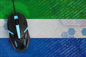 Sierra Leone flag  and computer mouse. Digital threat, illegal actions on the Internet photo