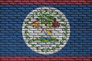 Belize flag is painted onto an old brick wall photo