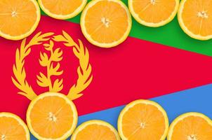 Eritrea flag  in citrus fruit slices horizontal frame photo
