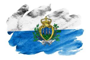 San Marino flag  is depicted in liquid watercolor style isolated on white background photo