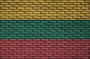 Lithuania flag is painted onto an old brick wall photo