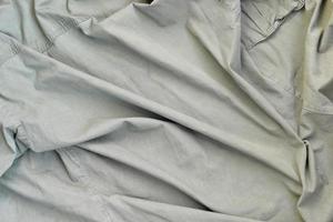 The texture of the fabric is olive-colored, which is similar to the uniform of American soldiers of the Second World War photo