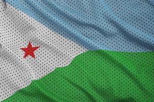 Djibouti flag printed on a polyester nylon sportswear mesh fabri photo