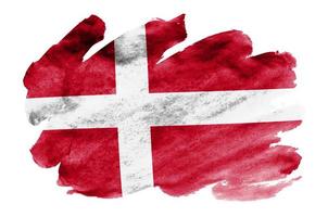 Denmark flag  is depicted in liquid watercolor style isolated on white background photo