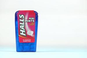 KHARKIV, UKRAINE - MAY 02, 2021 Halls Watermelon taste. Halls is the brand of a popular mentholated cough drop. Halls brand are owned by Mondelez International photo