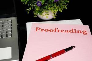 proofreading sheet on table photo