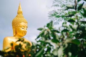 Magha Asanha Visakha Puja Day , Buddha statue , bodhi leaf with double exposure and len flared , soft image and soft focus style photo