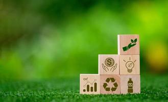 Saving energy and sustainability of renewable energy concept. Eco-efficiency is management of the business sector to be more competitive. Responsibility for natural resources and green environment. photo