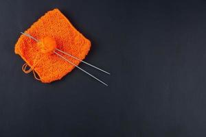 knitting on a black background photo