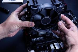 Installing or repair the air cooling system of the personal computer processor. photo