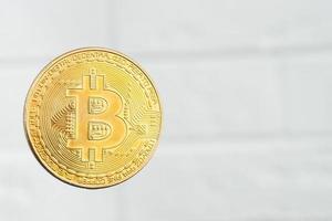 Gold Bitcoin on a white background photo