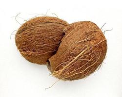 Coconut empty shells isolated on white background. photo