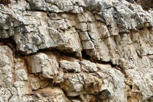 Texture of large stones and mountain rocks. photo