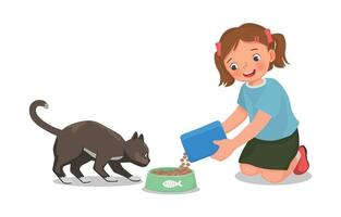 Cute little girl feeding her pet cat with animal food at home vector