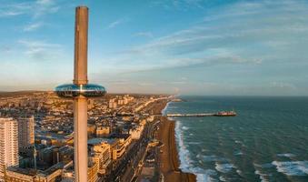 Magical sunset aerial view of British Airways i360 viewing tower pod with tourists in Brighton photo