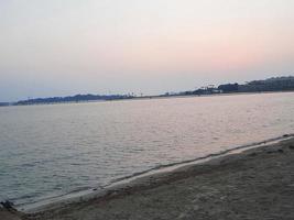 A beautiful evening and colorful sunset on Jeddah beach. photo