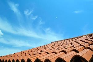 Tiled roof and sky photo