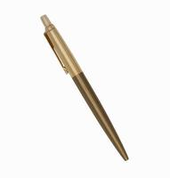 Diagonal gold ballpoint parker pen on white background photo