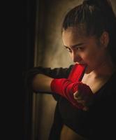 Young and beautiful female boxer photo