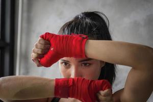 Young and beautiful female boxer photo