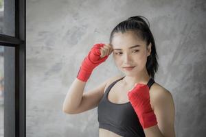 Young and beautiful female boxer photo