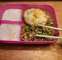 Lunch with fried noodles with beef eye eggs topped with green chili slices 04 photo