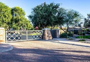 Metal Entrance Gate To Secure Housing Area photo