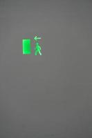 Green emergency exit light sign mexico, latin america photo