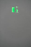 Green emergency exit light sign mexico, latin america photo