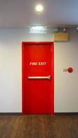 Emergency fire exit door. Red Color metal material. photo