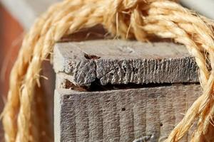 Old rope bound around an old vintage box in a close up. photo