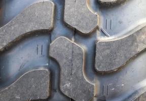 Close up view at almost new black tire treads photo