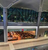 Istanbul, Turkey in July 2022. The condition of a flight departure hall at Istanbul Airport at night, looks quite deserted because the plane lands in the early hours of the morning, photo