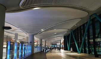 Istanbul, Turkey in July 2022. The condition of a flight departure hall at Istanbul Airport at night, looks quite deserted because the plane lands in the early hours of the morning, photo