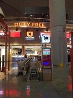 Istanbul, Turkey in July 2022. The condition of a flight departure hall at Istanbul Airport at night, looks quite deserted because the plane lands in the early hours of the morning, photo