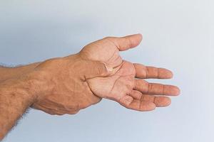 Hands gesture health care and medical concept pain numbness or weakness photo