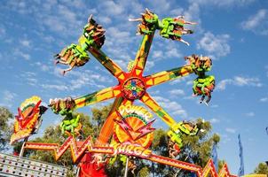 SYDNEY, AUSTRALIA. 2013 Colorful Power Surge amusement park ride at Sydney Royal Easter show. photo