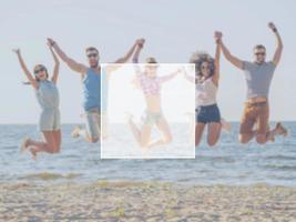 Fun with friends. Group of happy young people holding hands and jumping with sea in the background photo