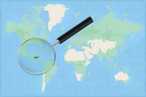 Map of the world with a magnifying glass on a map of Honduras. vector